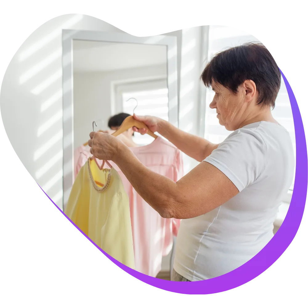 Elderly woman choosing outfit
