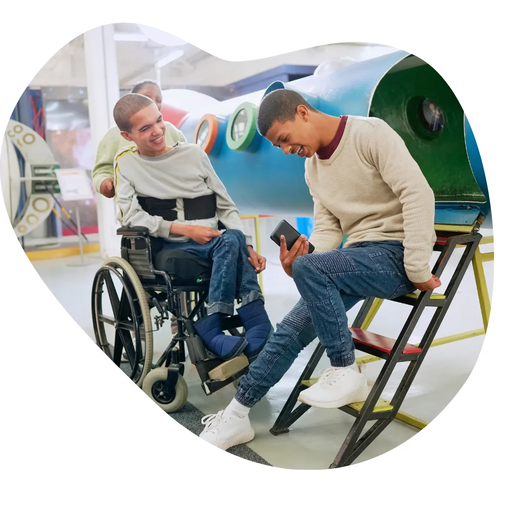 Two disabled friends laughing